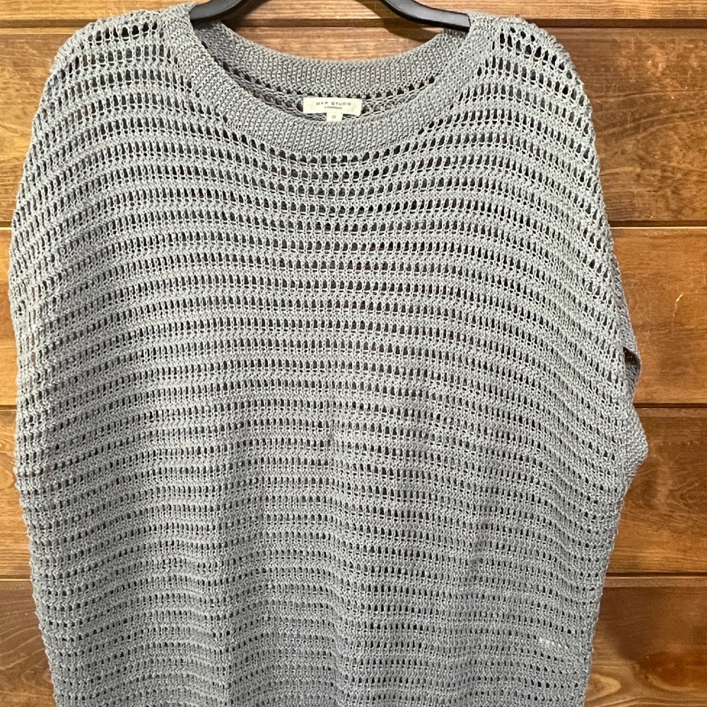Loose weave sleeveless sweater